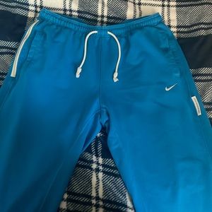 Blue Nike joggers, XL